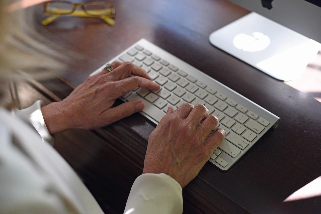 Kiev, Ukraine - May 20, 2013 - Hand pointing on keyboard with social media logotype collection of well-known social network brand's placed on keyboard buttons. Include Facebook, YouTube, Twitter, Google Plus, Instagram and more other logos.